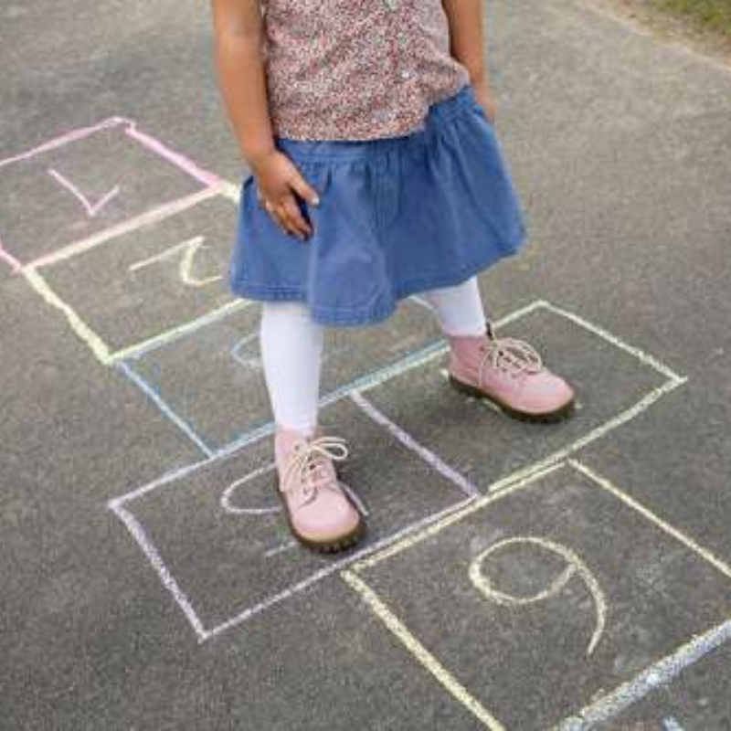 kids-playing-hopscotch-outside-500x333